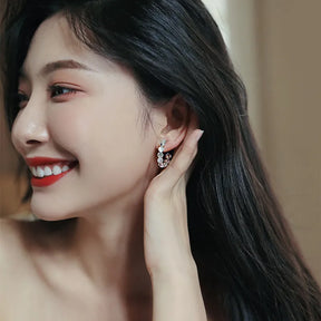 Boucles d’Oreilles Créoles Nacrées avec Zirconium