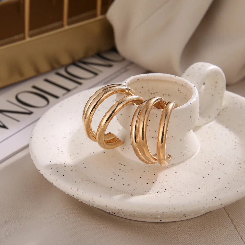 Boucles d’Oreilles Créoles Triples en Or 18K