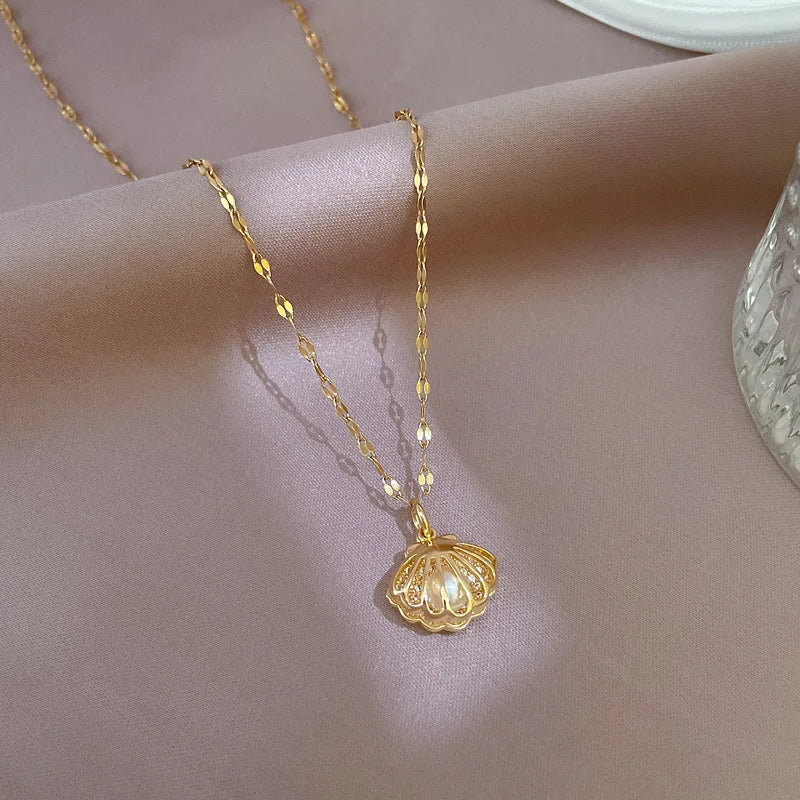 Collier Coquillage avec Perle 18K