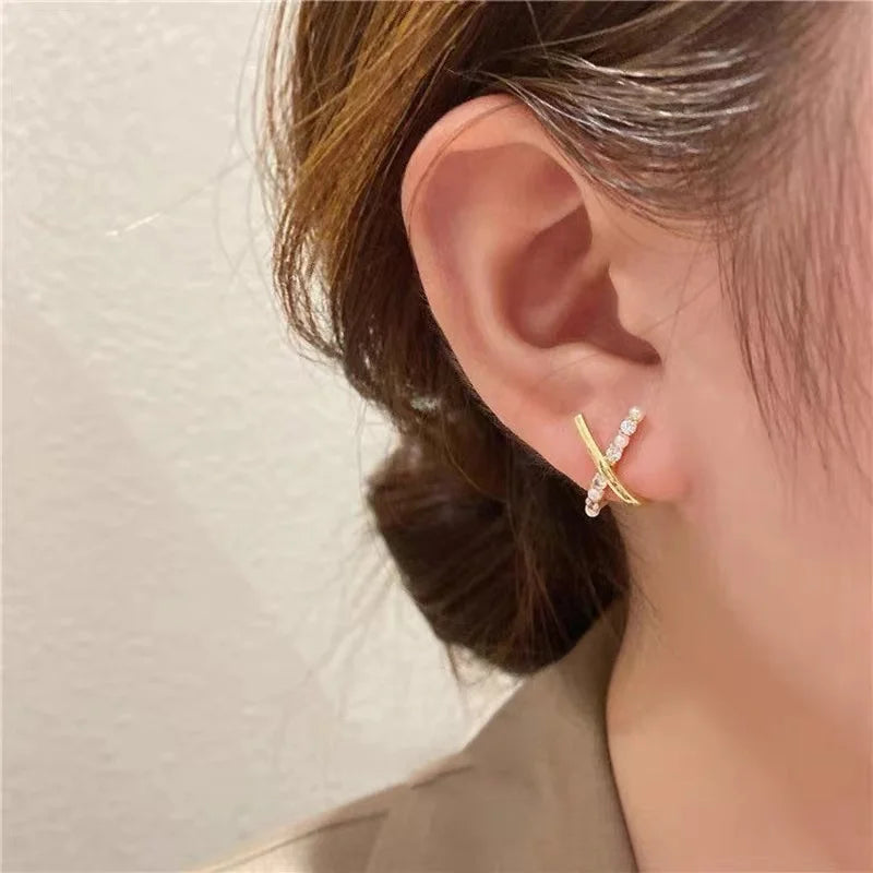Boucles d’Oreilles Doubles Serties de Zirconium