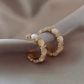 Boucles d’Oreilles Créoles Nacrées avec Zirconium