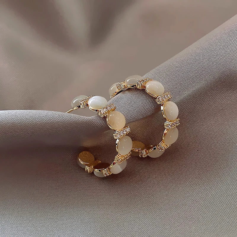 Boucles d’Oreilles Créoles Nacrées avec Zirconium