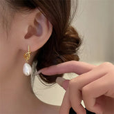Boucles d’oreilles Or Entrelacées avec Perle