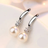 Boucle d’Oreille Incrustée de Zircone avec Perle