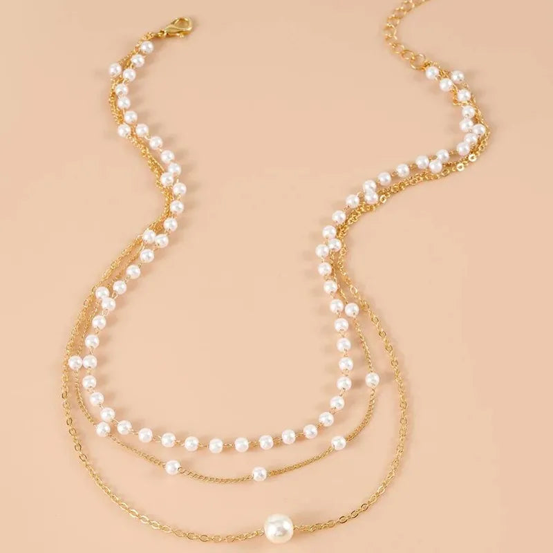 Collier Triple Perles d’Eau Douce Doré