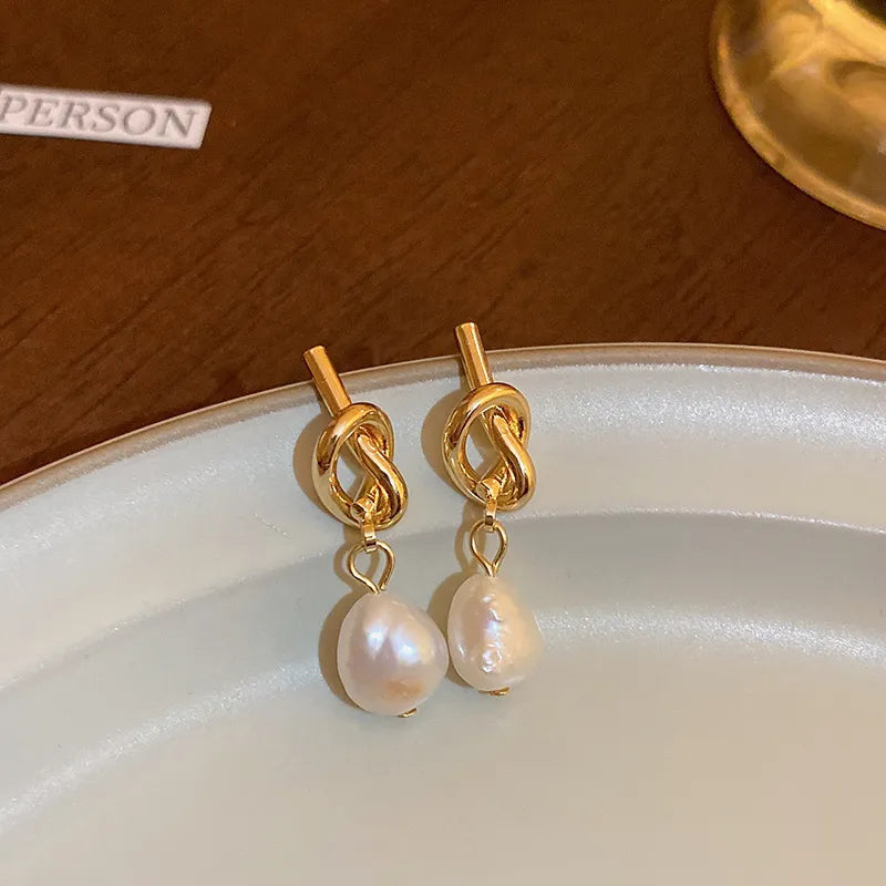 Boucles d’oreilles Or Entrelacées avec Perle
