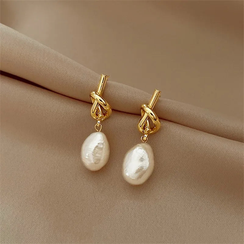 Boucles d’oreilles Or Entrelacées avec Perle