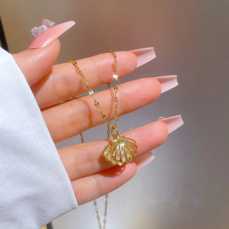 Collier Coquillage avec Perle 18K