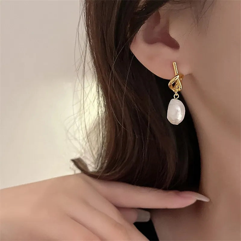 Boucles d’oreilles Or Entrelacées avec Perle