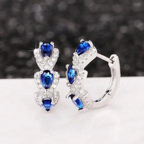 Boucles d’Oreilles Créoles Élégantes avec Pierres de Zirconium